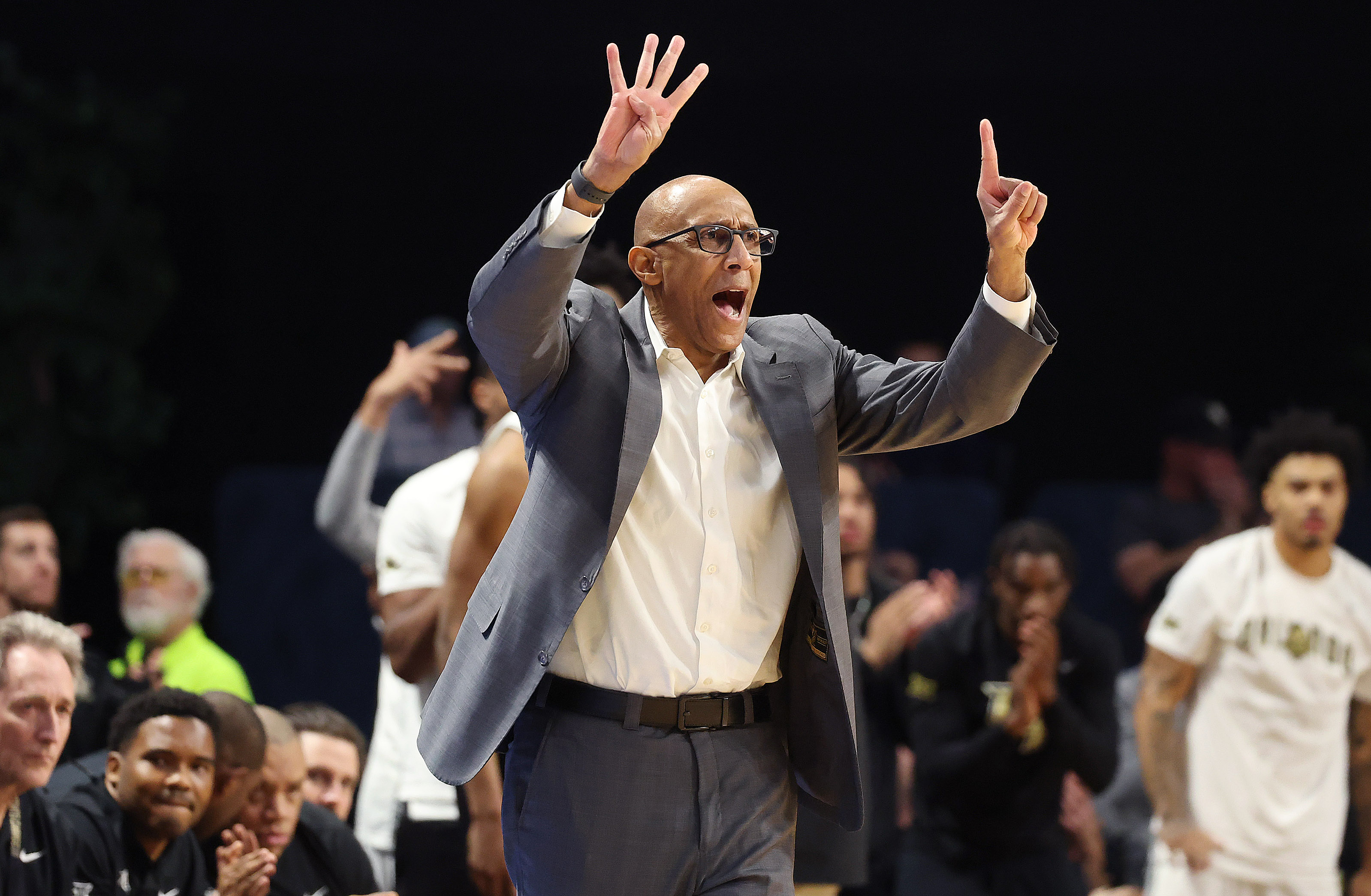 UCF coach Johnny Dawkins signals during the Arizona at UCF...