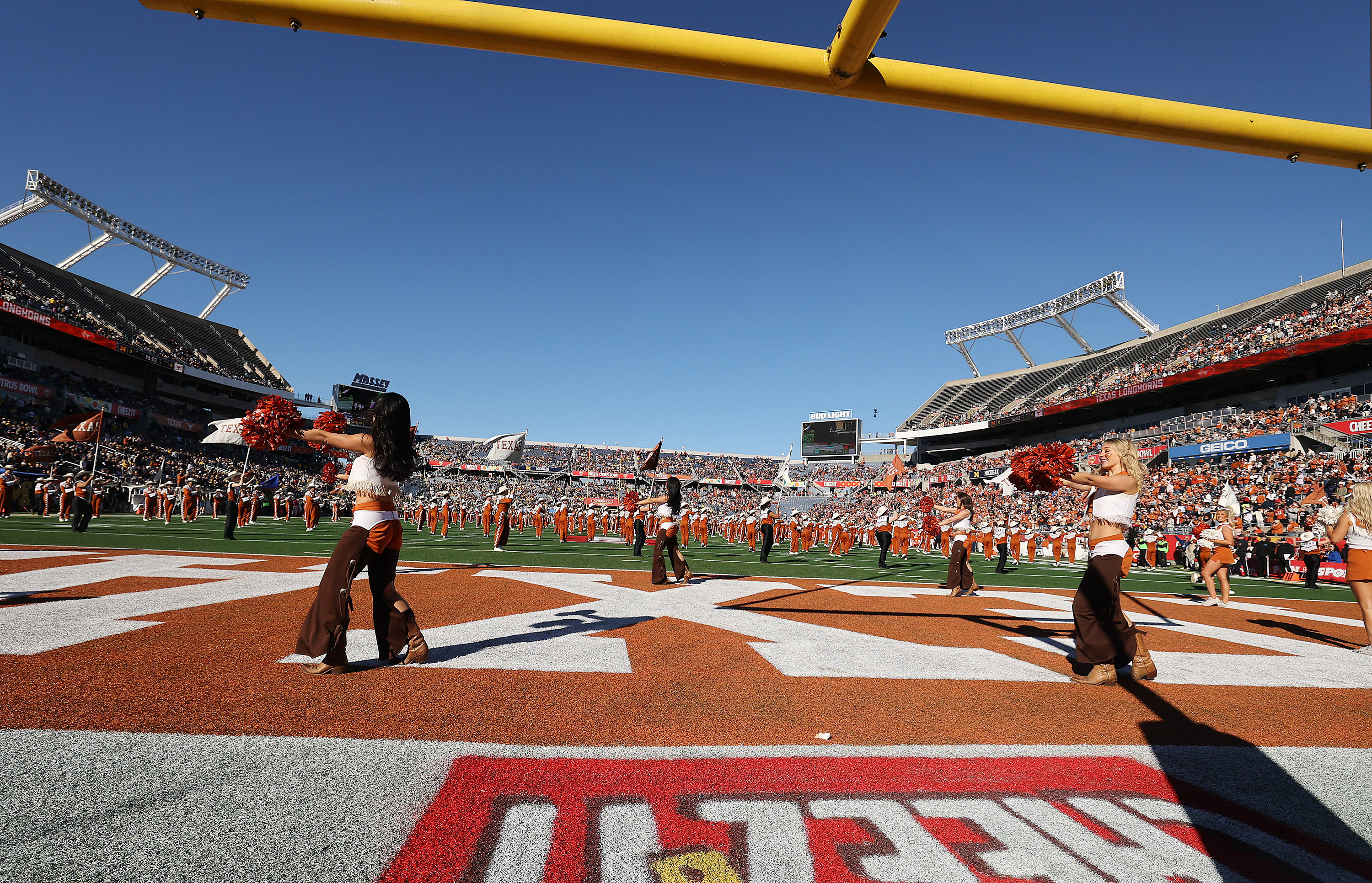 Texas cheerleaders cheer before the start of the Cheez-It Citrus...