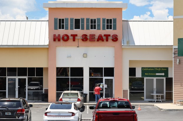 Hot Seats is pictured in a strip mall in Leesburg on Wednesday, July 30, 2025. (Stephen M. Dowell/Orlando Sentinel)