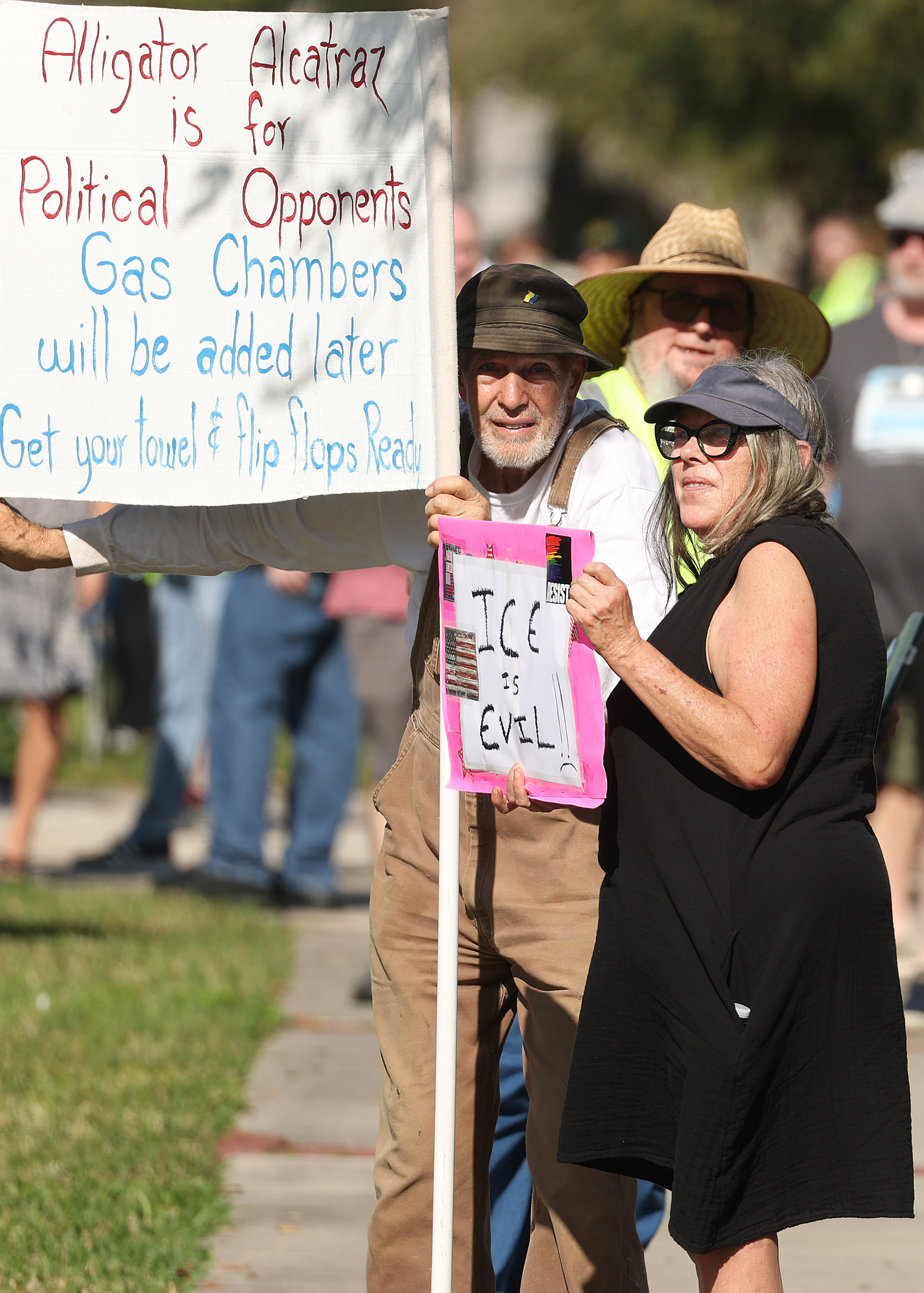 Protestors chant and hold signs during a âIce Out for...