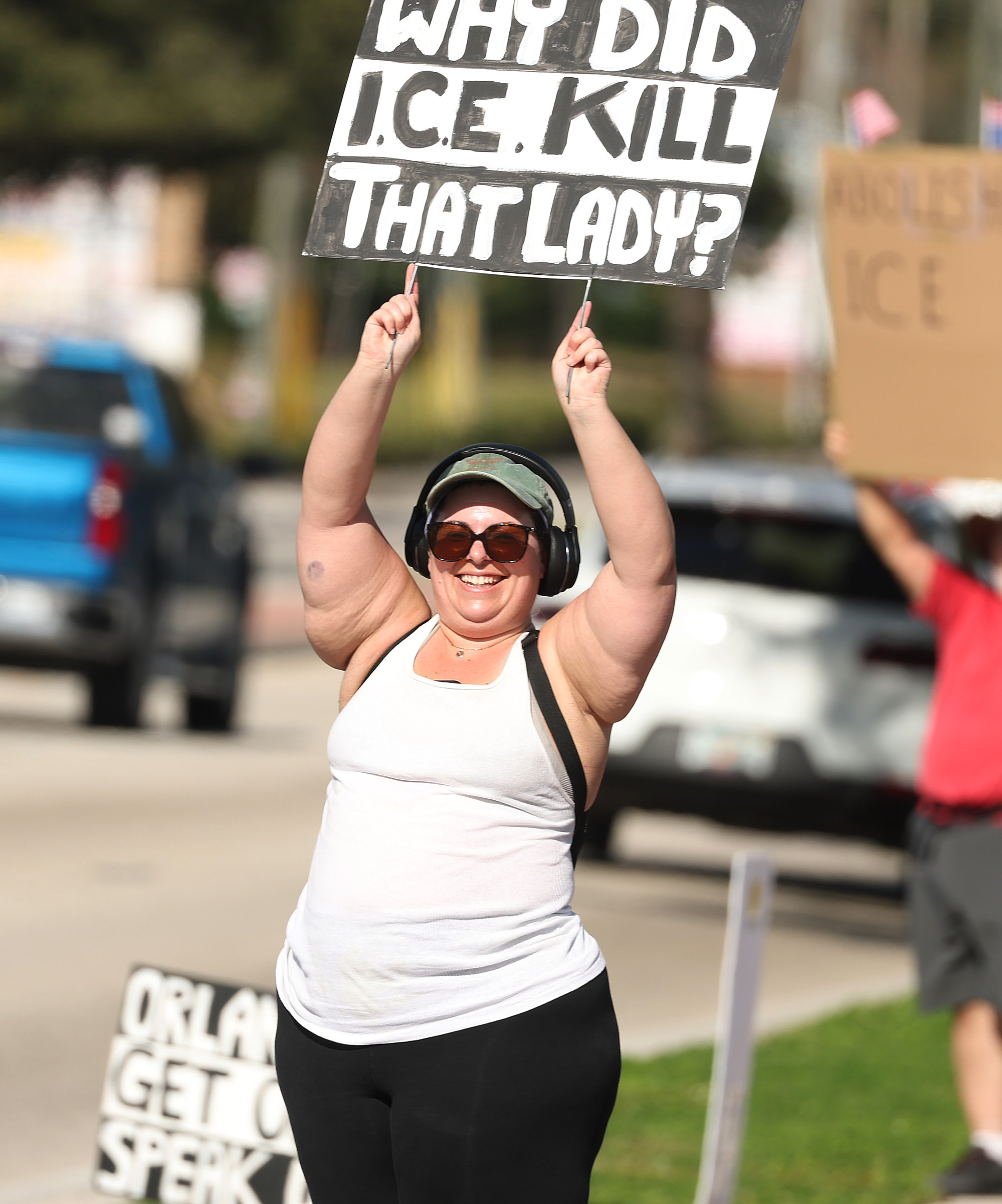 Protestors chant and hold signs during a âIce Out for...