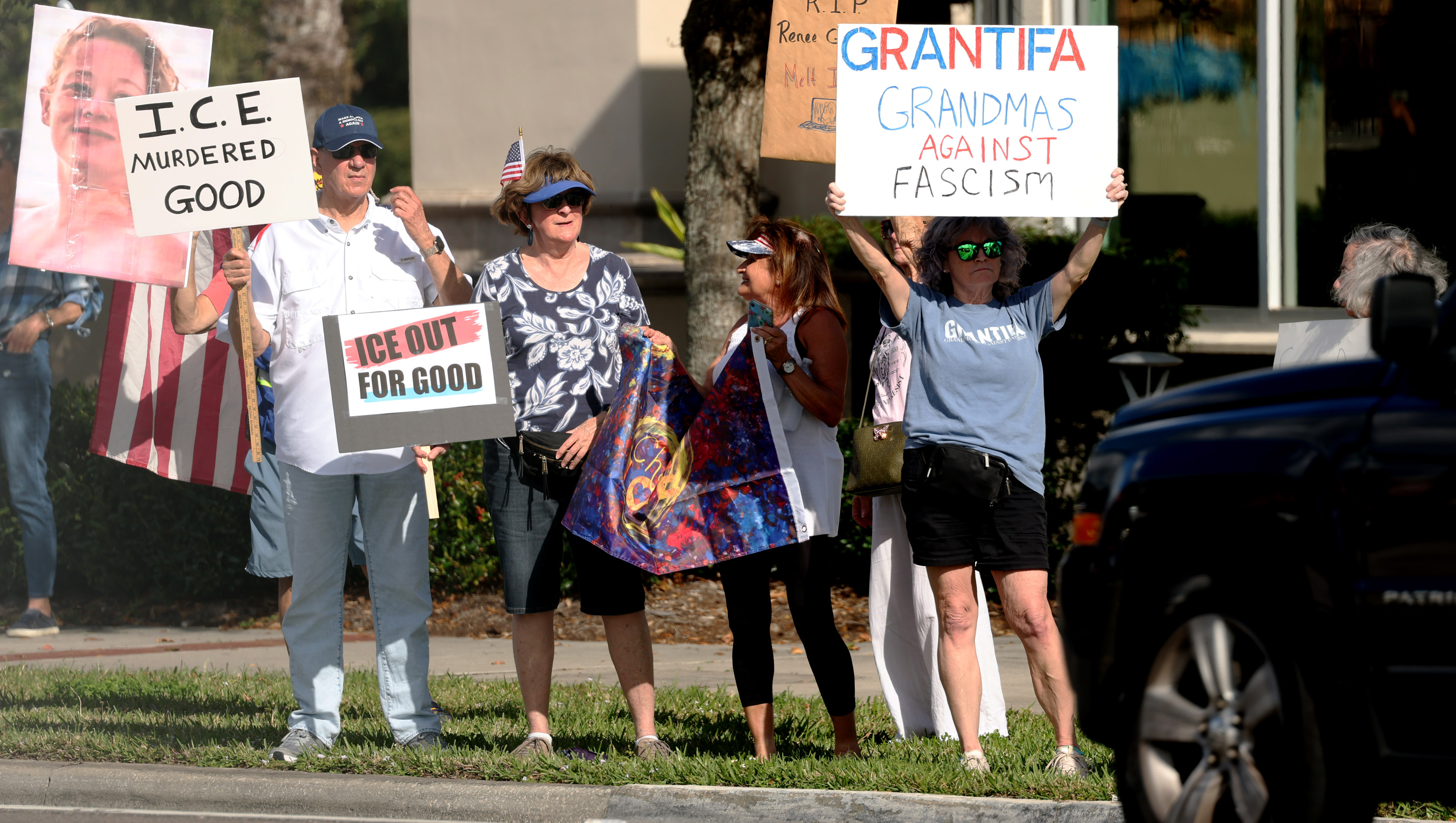 Protestors chant and hold signs during a âIce Out for...