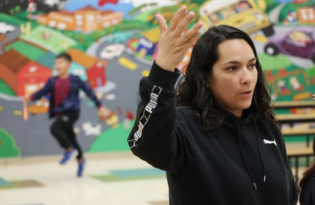 Karen Torres speaks following a meeting to discuss school closures at McCoy Elementary School in Orlando on Thursday, January 22, 2026. Orange County Public Schools may close the school as part of a consolidation effort. (Stephen M. Dowell/Orlando Sentinel)
