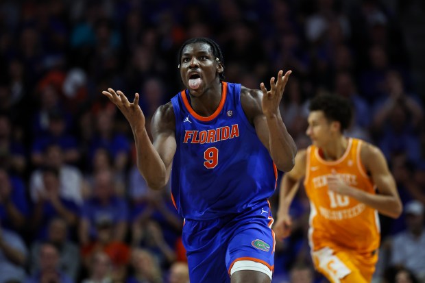 Florida center Rueben Chinyelu celebrates a dunk during the Gators' 91-64 win against Tennessee Jan. 10 in Gainesville. (Photo by James Gilbert/Getty Images)