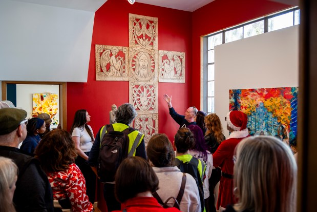Chief curator Dan Hess leads a tour during a "Sort of Brutally Early" art field trip at the Art and History Museums of Maitland on Dec. 17, 2025. (Patrick Connolly/Orlando Sentinel)