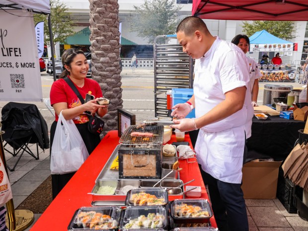 Seito Sushi Baldwin Park Chef/Partner Huy Tin grills up goodness at Celebrate Lunar 2025. They'll be back on Jan. 31. (Photo courtesy Celebrate Lunar)