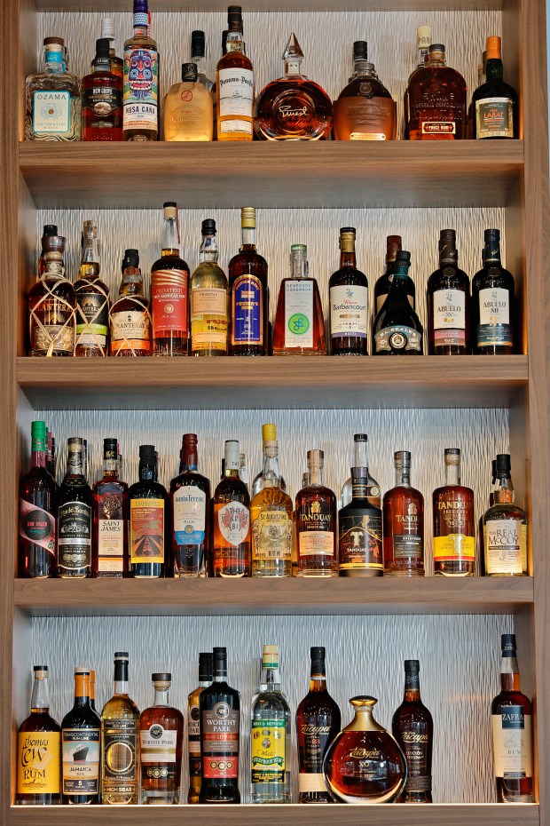 Bottles of rum are displayed behind the bar at Black Jack's Rum Bar & Grille in the Flagler Village neighborhood of Fort Lauderdale on Monday, Jan. 26, 2026. (Amy Beth Bennett / South Florida Sun Sentinel)
