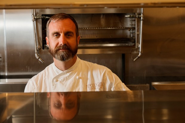 Chef-owner Michael Lewis is seen on March 3, 2025, in the kitchen of his new Fort Lauderdale restaurant. Lewis, the co-founder of Miami barbecue hot spot KYU, is back with another Asian-inspired, wood-fired restaurant called Ukiah Japanese Smokehouse, opening this spring on Fort Lauderdale's Riverwalk. (Joe Cavaretta/South Florida Sun Sentinel)