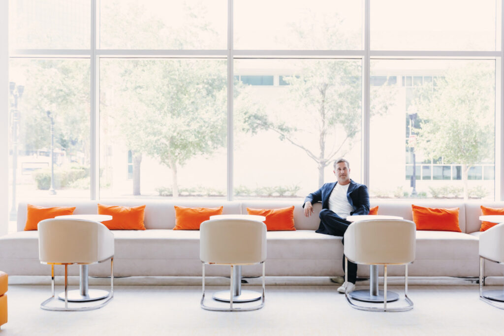 Tim Giuliani lounging and thinking like a boss.