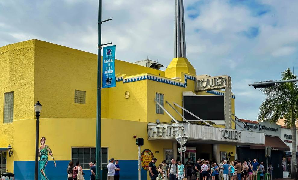 Why the Tower Theater’s return to Miami Dade College matters right now 2 People gathered outside the Tower Theater in Miami.