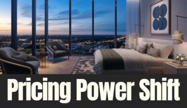 Luxury hotel suite rendering at Hotel ORA with floor-to-ceiling windows overlooking downtown Tampa at dusk.