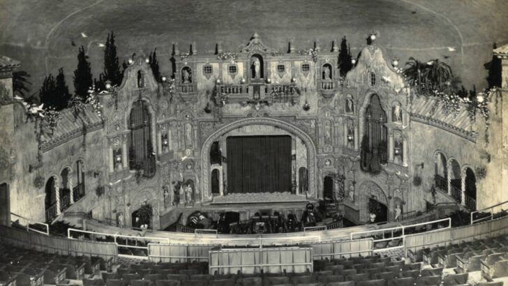Historic interior of Tampa Theatre showing the ornate stage, Mediterranean-style façade and original seating during its early years.