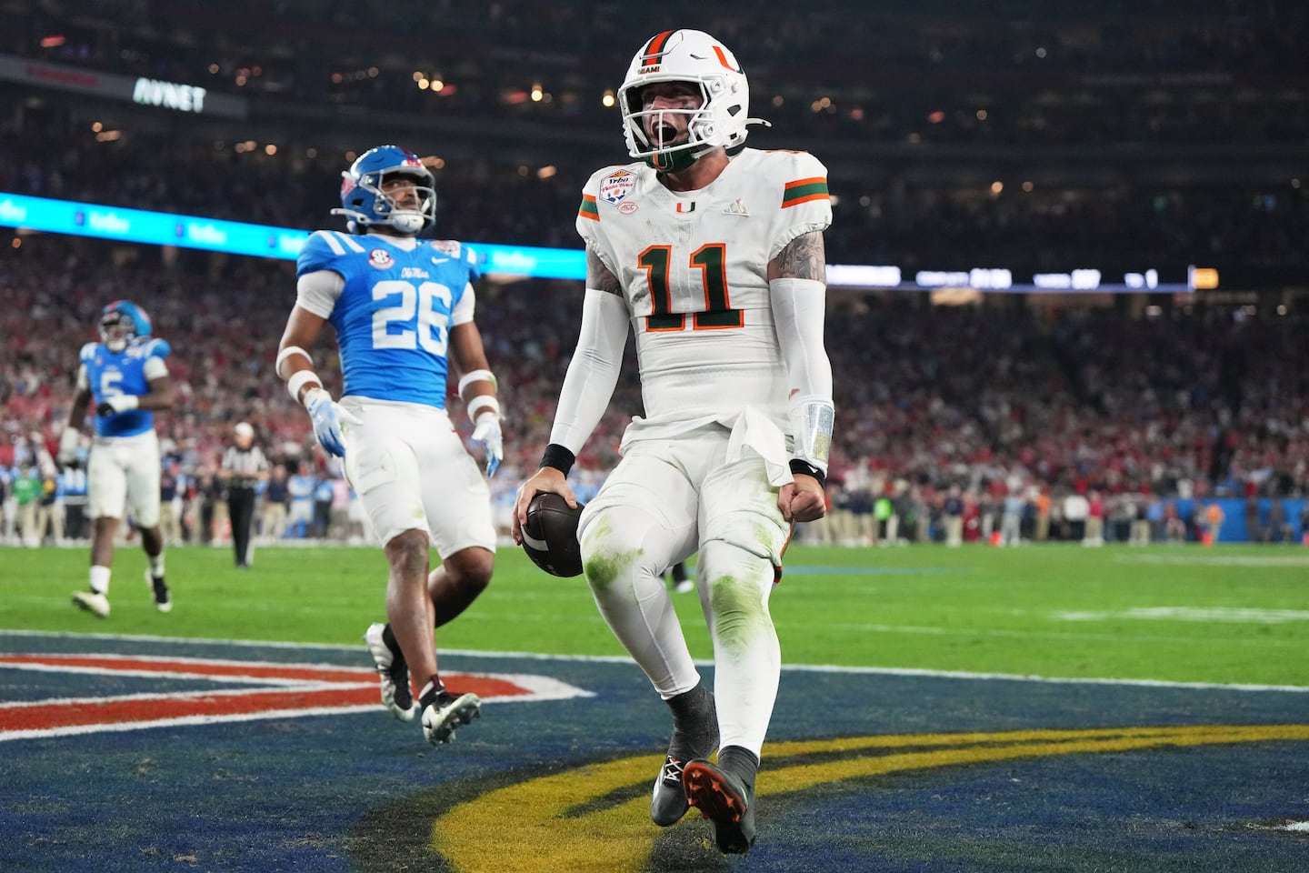Miami quarterback Carson Beck gave the Hurricanes the lead for good with a 3-yard touchdown run with 18 seconds remaining in the Fiesta Bowl win over Mississippi.