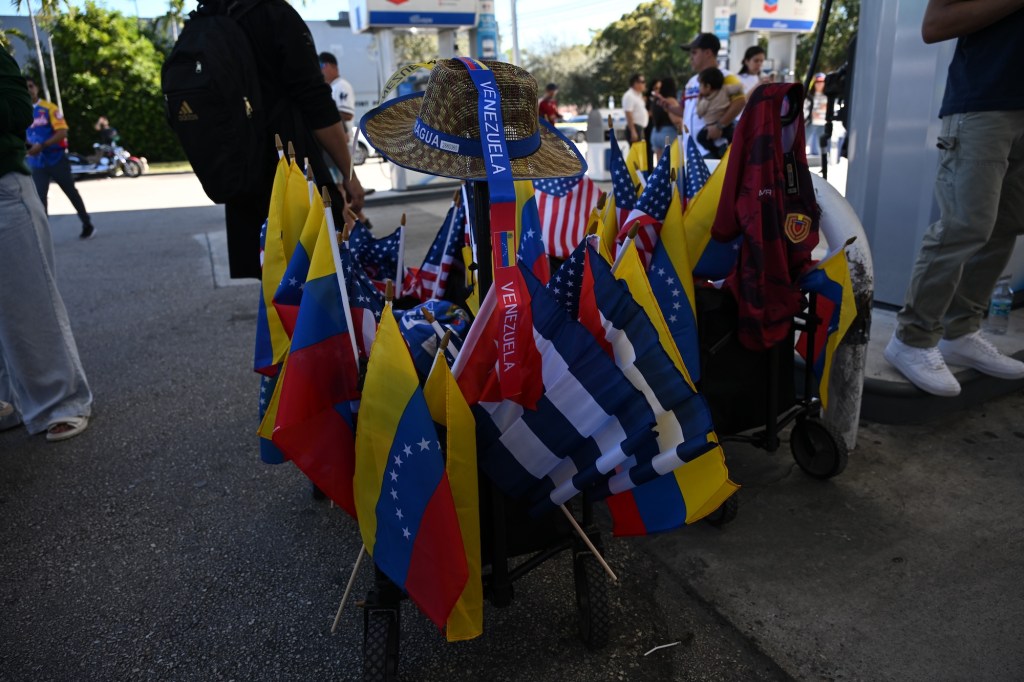 photo of a rolling chair holding Venezuelan flags