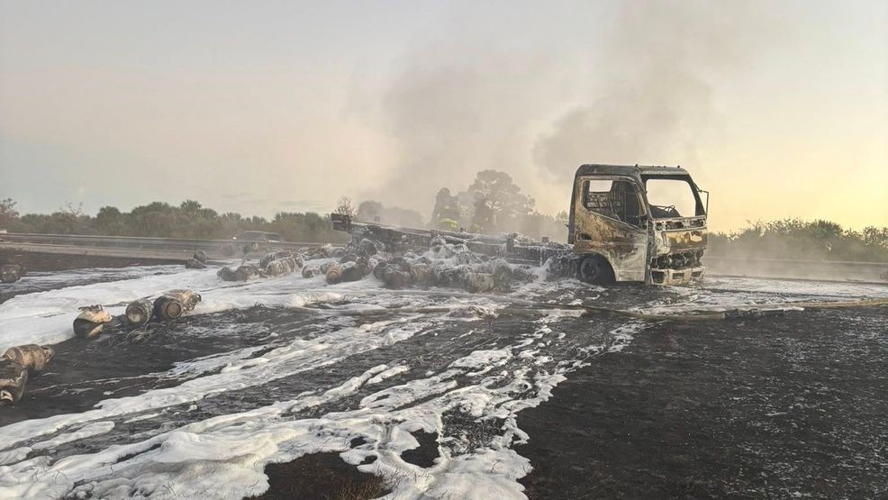 An early morning blaze transformed a stretch of the Florida Turnpike into a chaotic scene as firefighters battled a commercial vehicle fire engulfing a truck loaded with over 240 propane tanks. (SLCFD)