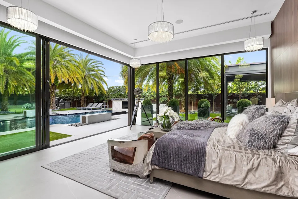 Master bedroom in celebrity developer Aldo Stars home in Florida
