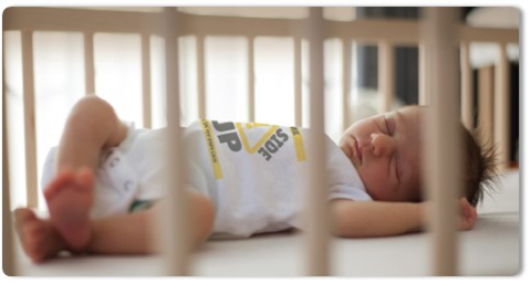 baby sleeping in crib