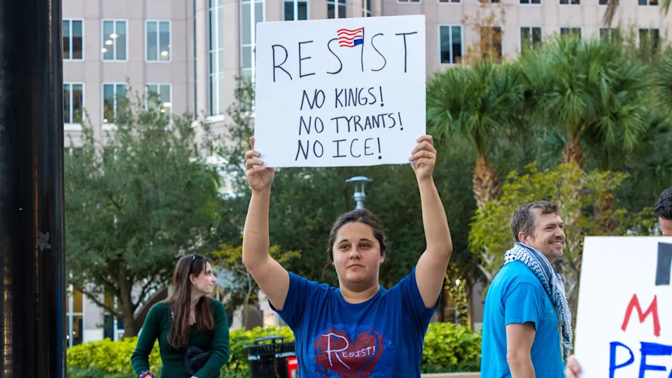 Several dozen people gathered in downtown Orlando in Jan. 2026 after a woman was shot and killed in Minneapolis.