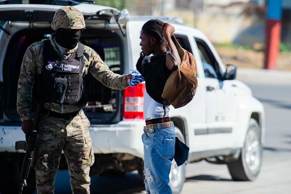 Police patrol Port-au-Prince, Haiti near Toussaint Louverture International Airport after reports of more gang shootings, in this photo from February 2025. Haiti's capital could become overrun by criminal gangs if the international community does not step up aid to a UN-backed security mission there, the UN warned in a January 2025 report.