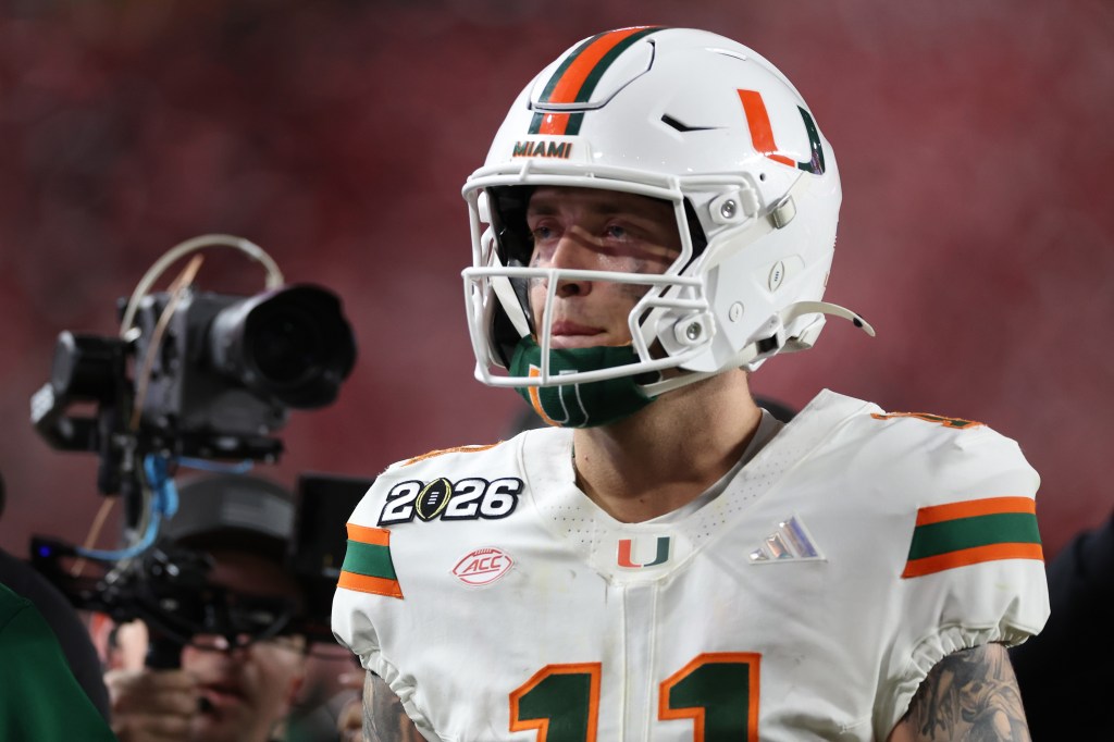 Carson Beck #11 of the Miami Hurricanes in his football uniform after a loss.