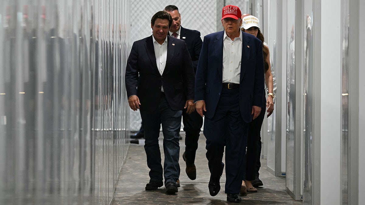 DeSantis walks alongside Trump