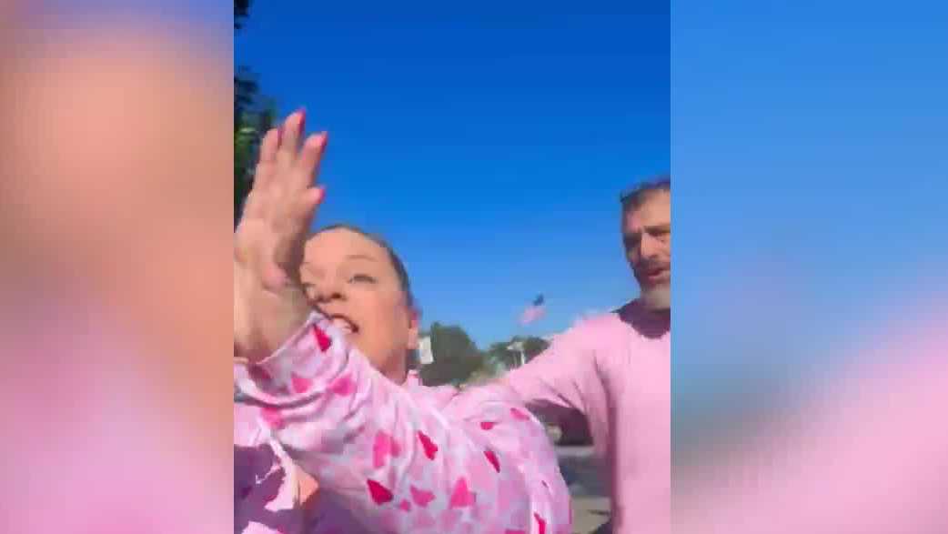 Woman cited after alleged battery caught on cam in Florida parking dispute