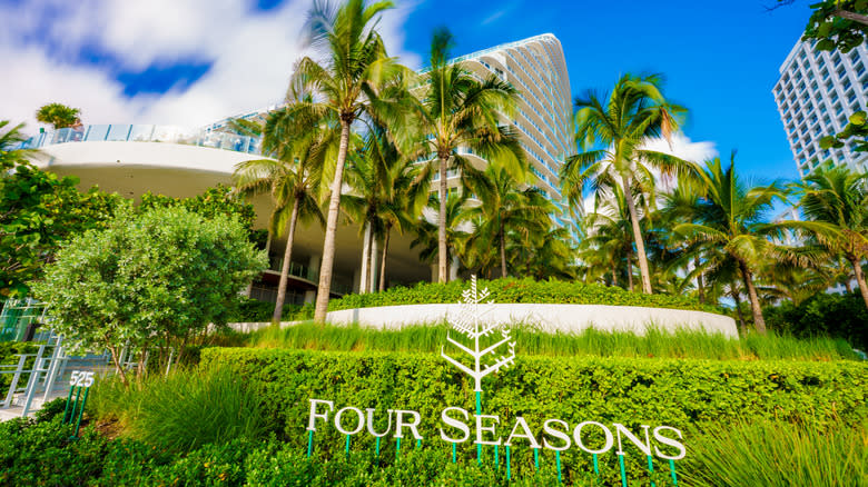 Lush gardens and palm trees fronting the Four Seasons resort.