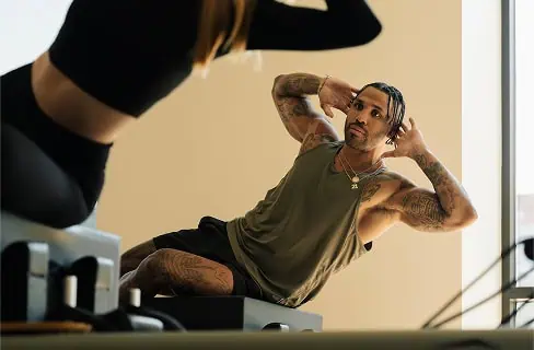 People in a pilates studio