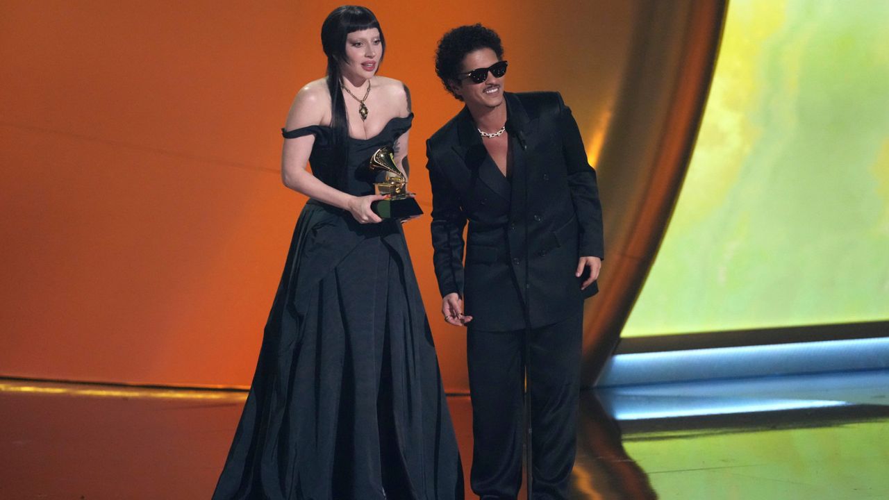 Lady Gaga, left, and Bruno Mars accept the award for best pop duo/group performance for "Die With A Smile" during the 67th annual Grammy Awards last y ear in Los Angeles. (AP Photo/Chris Pizzello)