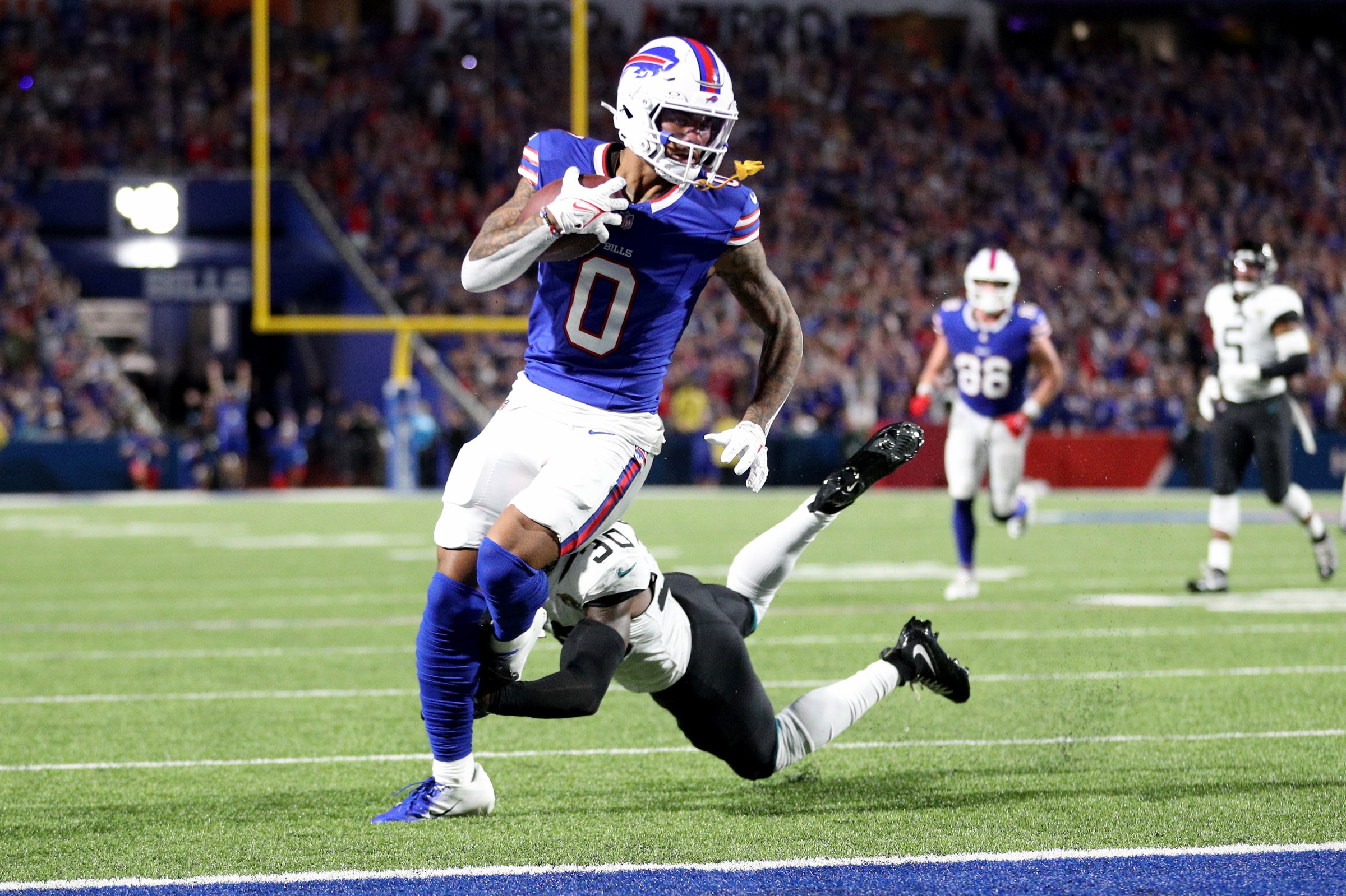 ORCHARD PARK, NEW YORK - SEPTEMBER 23: Keon Coleman #0 of the Buffalo Bills scores a touchdown during the second quarter against the Jacksonville Jaguars at Highmark Stadium on September 23, 2024 in Orchard Park, New York. (Photo by Bryan M. Bennett/Getty Images)