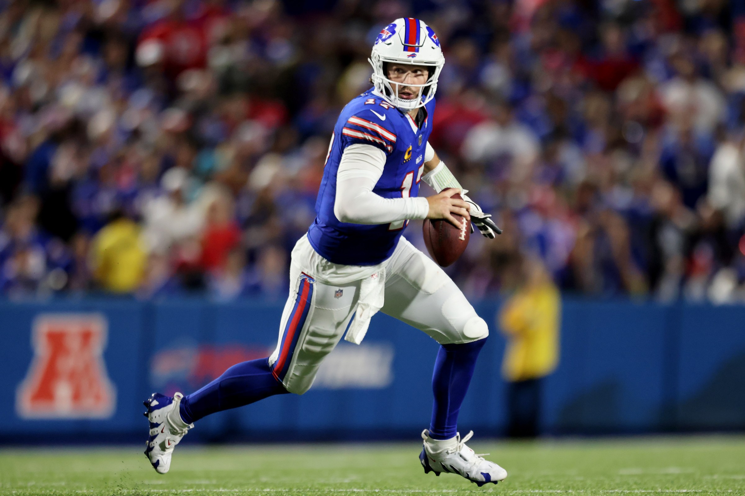 ORCHARD PARK, NEW YORK - SEPTEMBER 23: Josh Allen #17 of the Buffalo Bills runs the ball during the third quarter against the Jacksonville Jaguars at Highmark Stadium on September 23, 2024 in Orchard Park, New York. (Photo by Bryan M. Bennett/Getty Images)