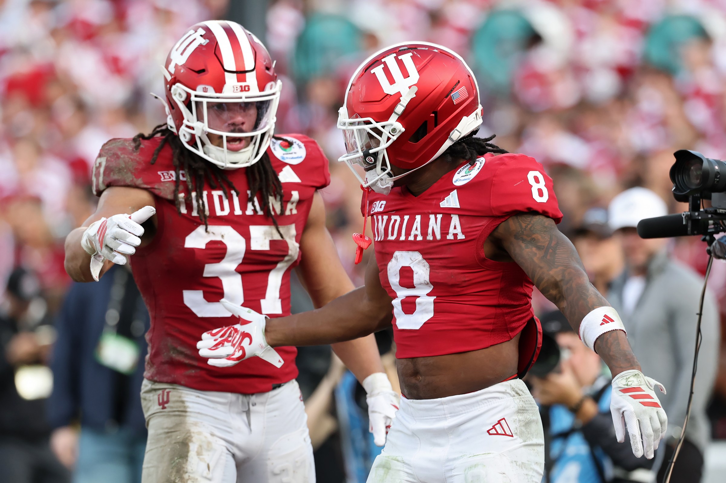PASADENA, CALIFORNIA - JANUARY 01: Riley Nowakowski #37 and Kaelon Black #8 of the Indiana Hoosiers celebrate after Black ran for a touchdown in the fourth quarter against the Alabama Crimson Tide in the College Football Playoff Quarterfinal at Rose Bowl Stadium on January 01, 2026 in Pasadena, California. (Photo by Sean M. Haffey/Getty Images)
