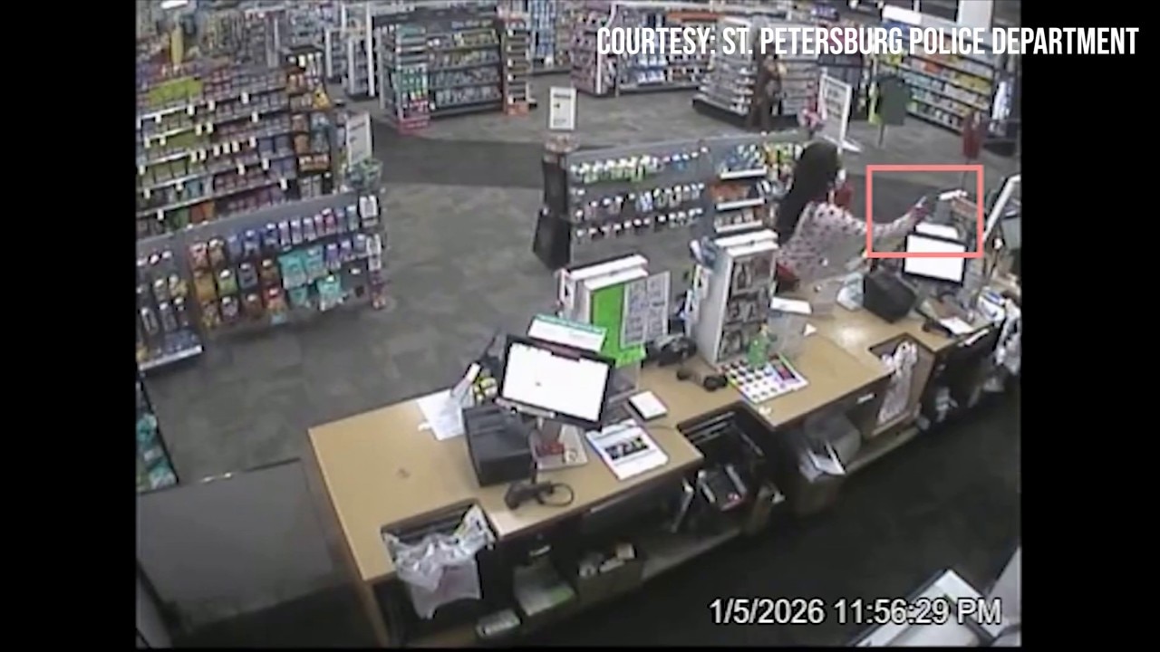 Video: Two masked robbers pepper spray CVS clerks