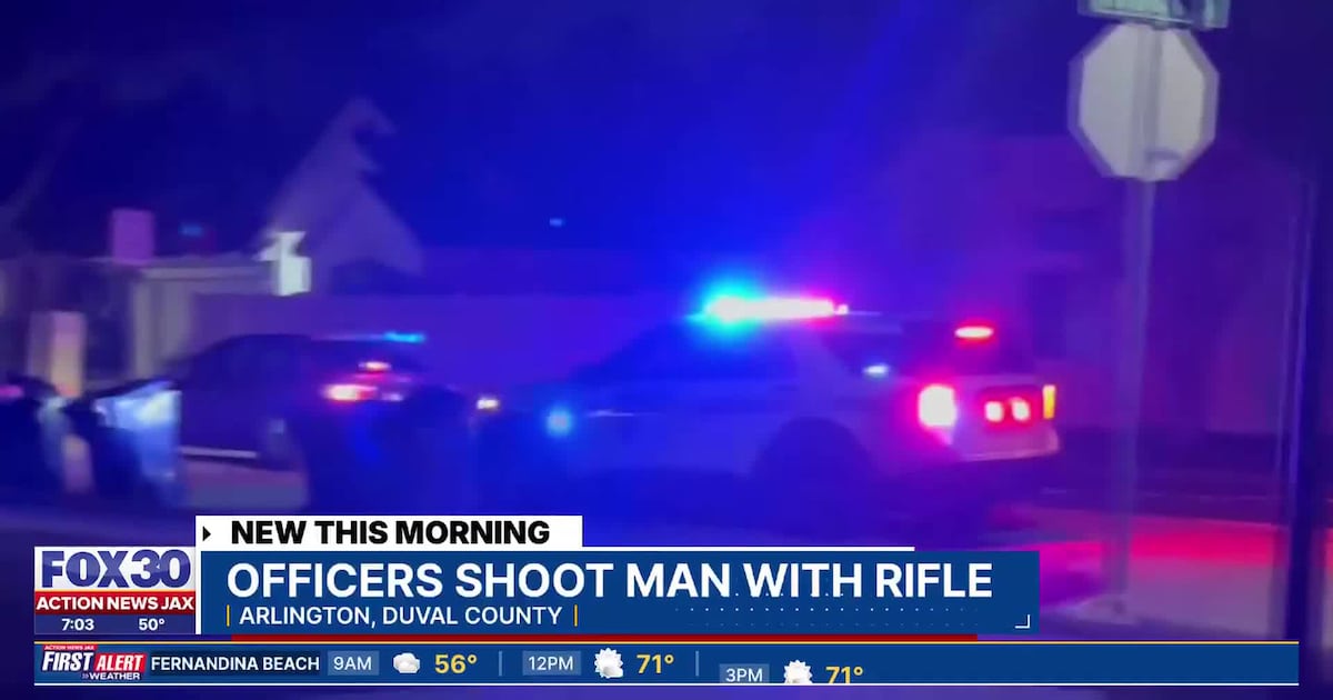 Man in garage holding rifle shot by Jacksonville officers at Arlington home – Action News Jax