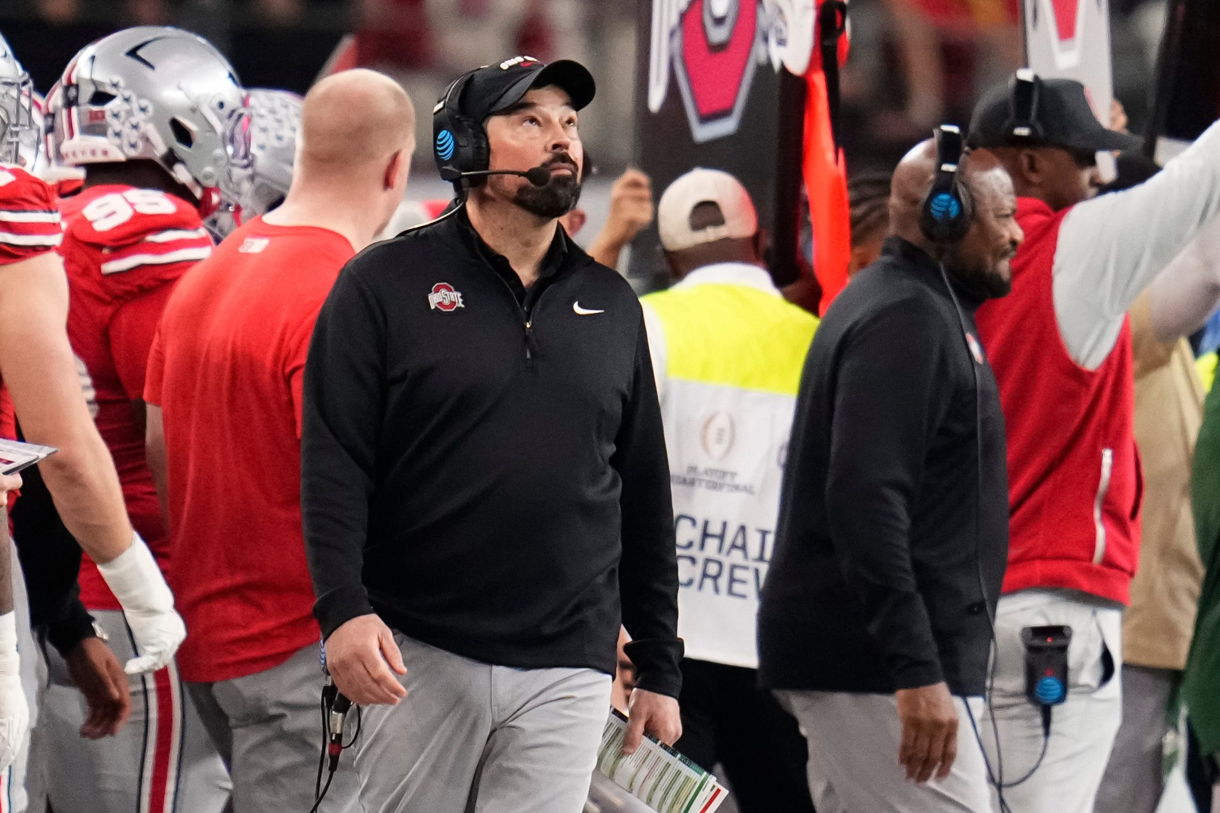 Ohio State Buckeyes head coach Ryan Day looks to the scoreboard during the Cotton Bowl at AT&T Stadium in Arlington, Texas for the College Football Playoff quarterfinal game against the Miami Hurricanes on Dec. 31, 2025.