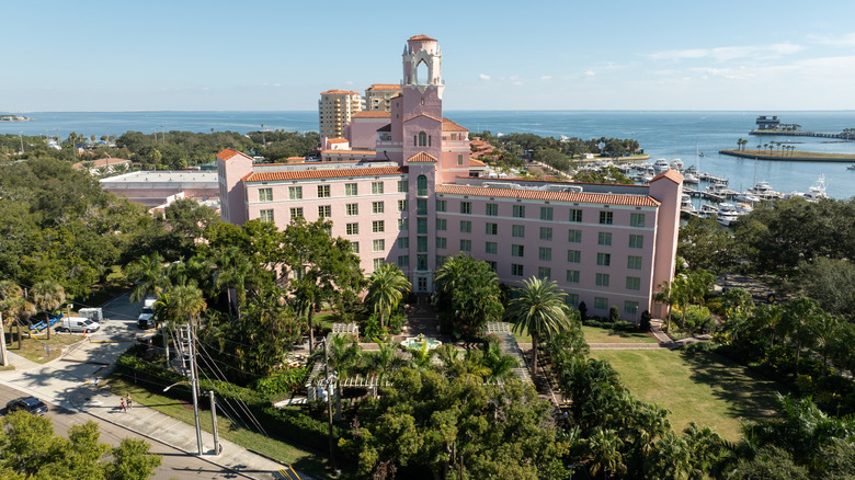 Exterior of The Vinoy overlooking the water and surrounded by trees