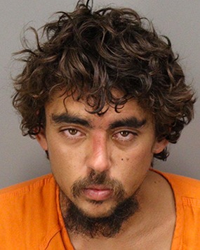 Austin Simmons was arrested at a Florida bus terminal for allegedly attacking a bystander with a ketchup packet.