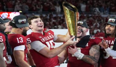 Indiana quarterback Fernando Mendoza holds the trophy after their win against Miami in the College Football Playoff national championship game, Monday, Jan. 19, 2026, in Miami Gardens, Fla. (AP Photo/Marta Lavandier)