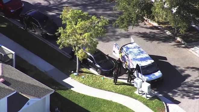 multiple orange county deputies are in a windermere neighborhood on tuesday afternoon.