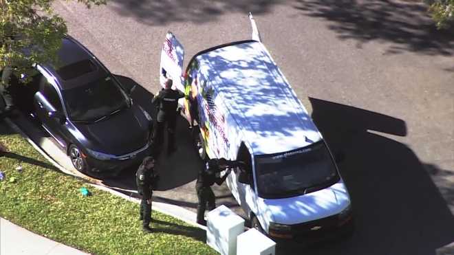 multiple orange county deputies are in a windermere neighborhood on tuesday afternoon.