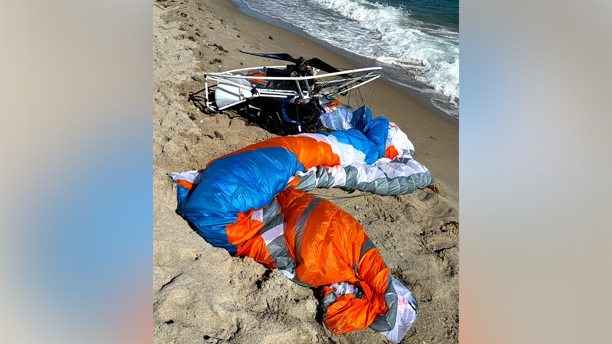 powered paraglider craft on the beach