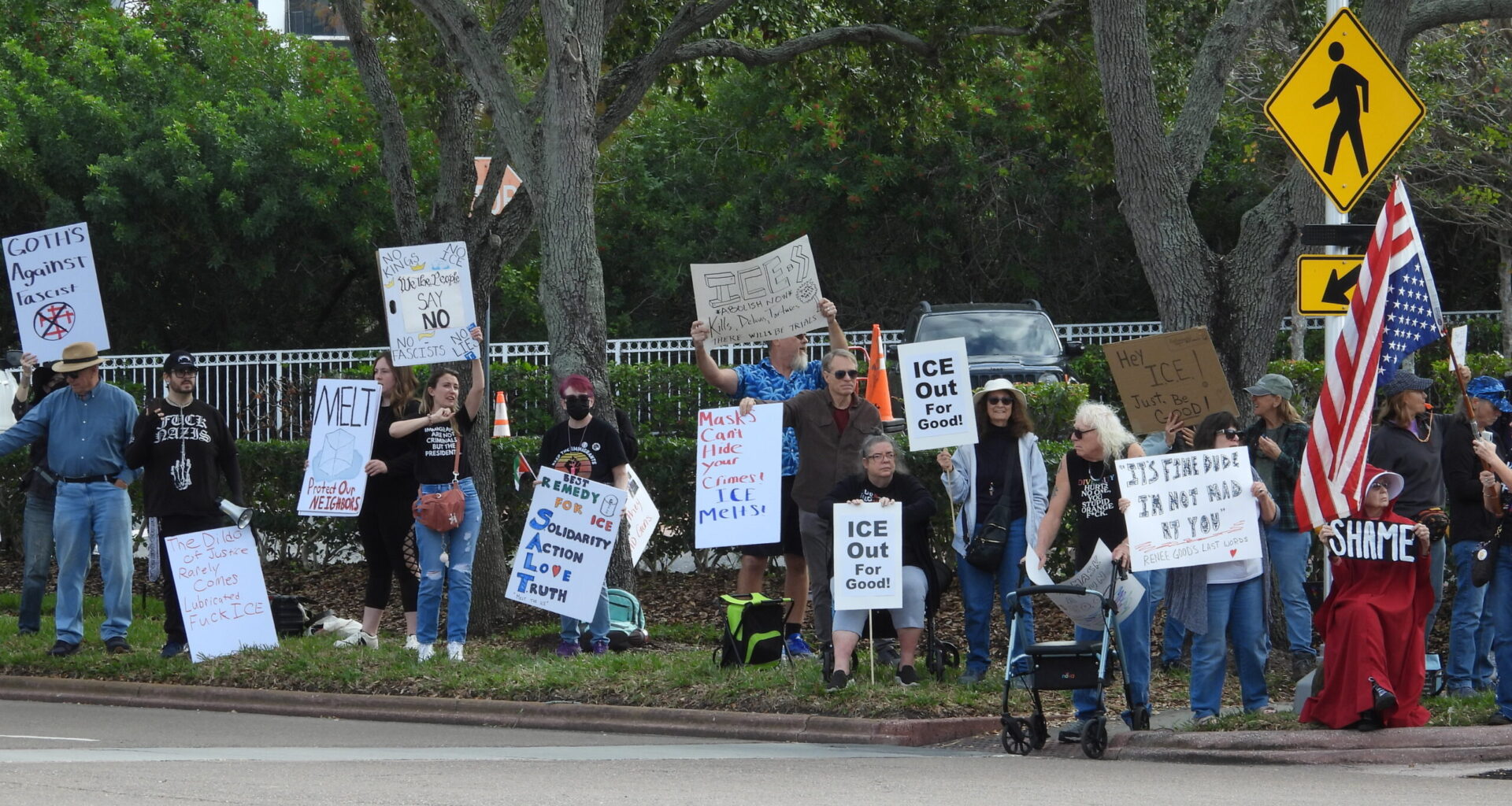 Protestors decry ICE outside of Customs & Border Protection recruiting event at St. Petersburg Hilton