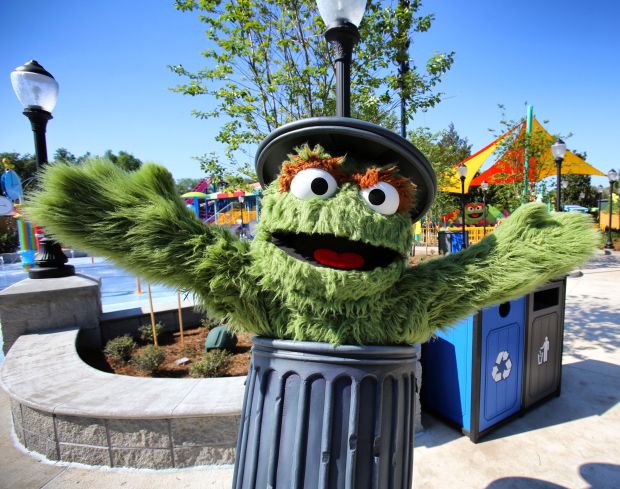 Oscar The Grouch greets guests at Sesame Street at SeaWorld Orlando, Tuesday, March 26, 2019. The new section of the park officially opens to guests on Wednesday. (Joe Burbank/Orlando Sentinel) 3075270