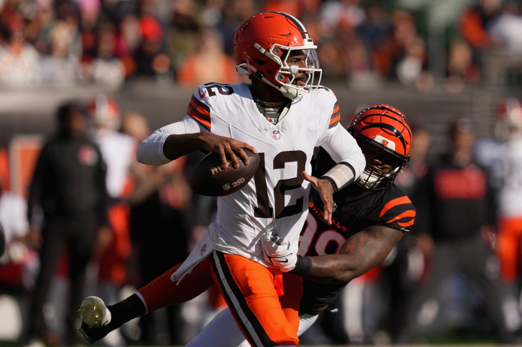 Shedeur Sanders #12 of the Cleveland Browns throws a pass against Myles Murphy #99 of the Cincinnati Bengals at Paycor Stadium on January 04, 2026 in Cincinnati, Ohio. 