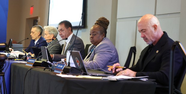 The Fort Lauderdale commission - Ben Sorensen (from left), Steve Glassman, Mayor Dean Trantalis, Pamela Beasley-Pittman and Vice Mayor John Herbst - discuss the prospect of eliminating the tree-lined median on Las Olas during a meeting at the Broward Center for the Performing Arts on Tuesday. (Carline Jean/South Florida Sun Sentinel)