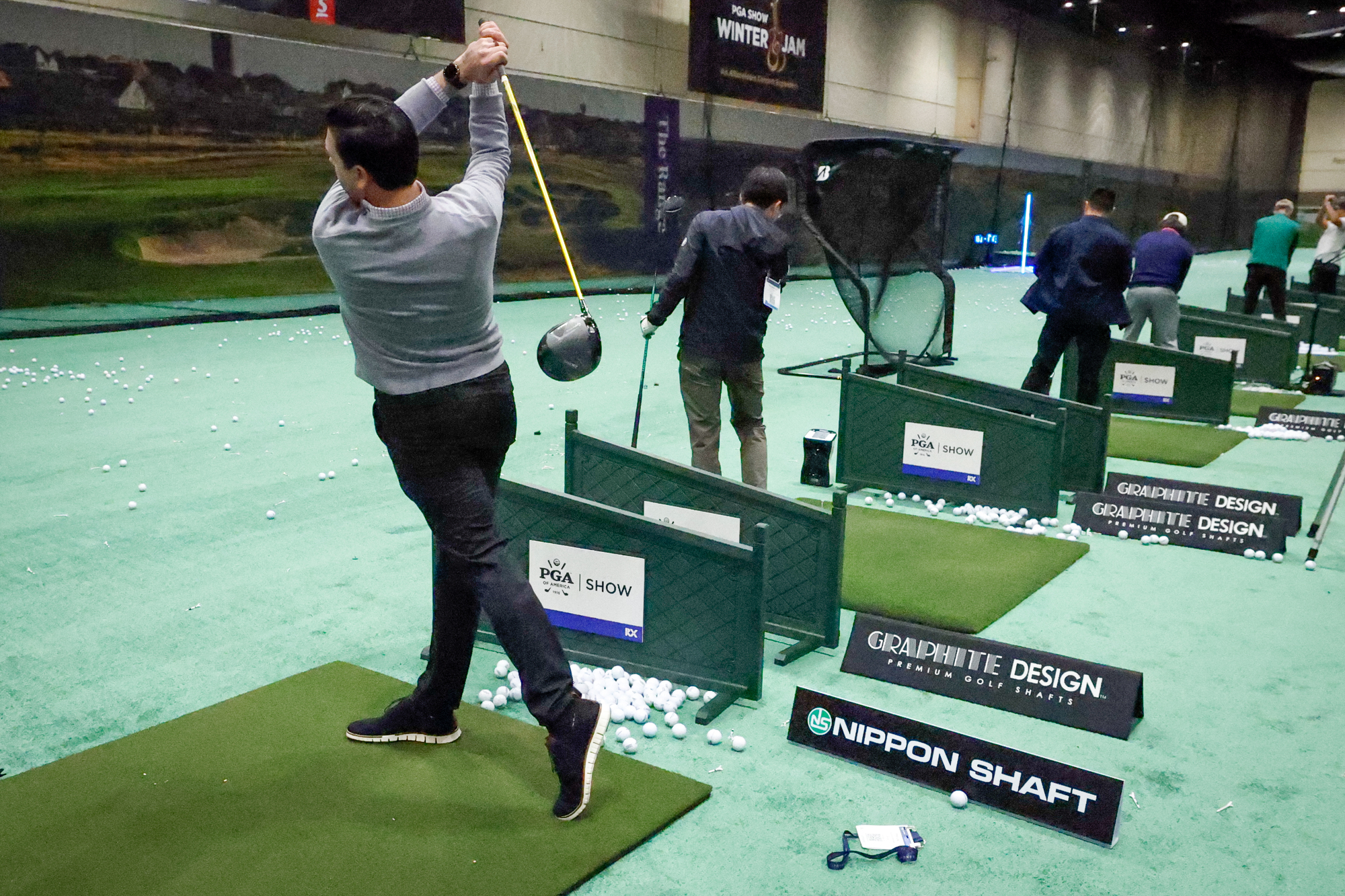 A PGA Show attendee demos a Nippon Shaft at the...