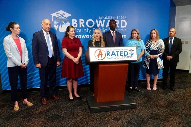 Broward County School Board Chair Sarah Leonardi, center, and members of the School Board hold a news conference at the Kathleen C. Wright Administration Center in Fort Lauderdale, Tuesday, Jan. 13, 2026. (Joe Cavaretta/South Florida Sun Sentinel)