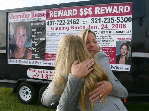 Joyce Kesse, right, mother of Jennifer Kesse, receives a hug Thursday, Jan. 24, 2008, from Hailey Winslow, 22, a University of Central Florida student in Orlando, Fla. The Kesse family and friends met to bring awareness to the public 2 years after Jennifer Kesse went missing. Her case gained national attention and remains unsolved. (AP Photo/Orlando Sentinel, Red Huber) **DAILY SUN OUT; DAYTONA BEACH NEWS-JOURNAL OUT; LEESBURG COMMERCIAL OUT; PALM BEACH POST OUT; MIAMI HERALD OUT; NUEVA DIA OUT; MAGS OUT; TV OUT; NO SALES** ORG XMIT: ORL0801241044182794