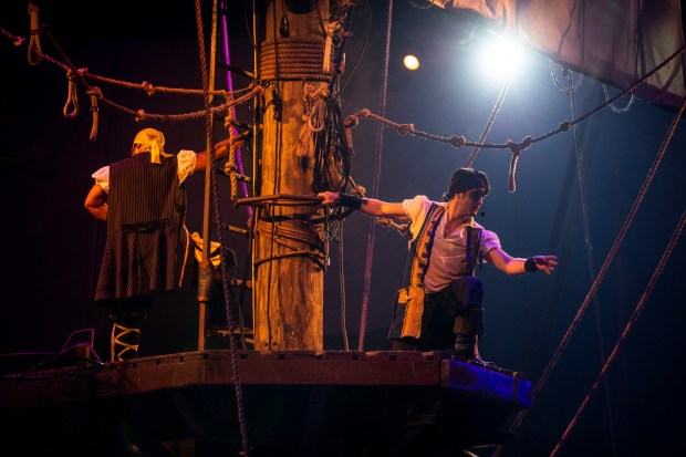 Swashbuckling pirates dance and climb around the stage at Pirate's Dinner Adventure in March 2020. (Orlando Sentinel file)