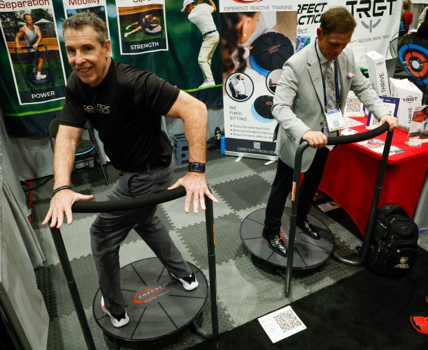 Anthony Carey gives a demonstration of the Cor-tex reactive training platform, which he invented, on display at the PGA Show, Jan. 22 at the Orange County Convention Center. (Rich Pope, Orlando Sentinel)